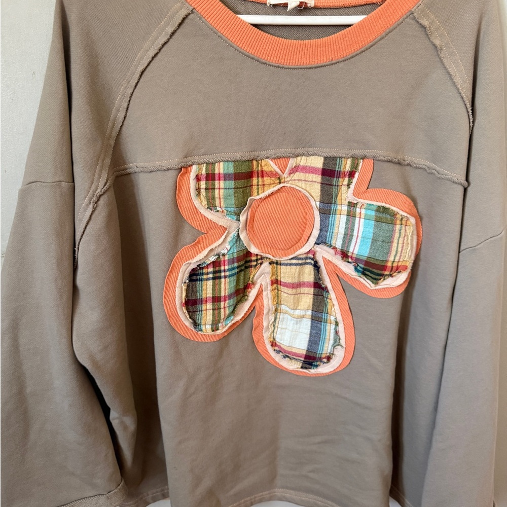 Easel Women’s Taupe Sweatshirt with Orange Plaid Flower Applique